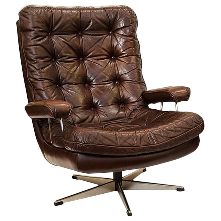 Danish Swivel Lounge Chair of Tufted Leather at 1stDibs