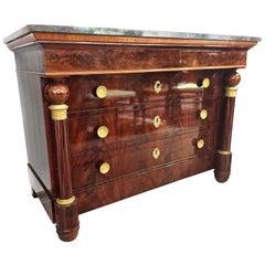 Early 19th Century Empire Flame Mahogany and Black Marble French Chest of Drawer