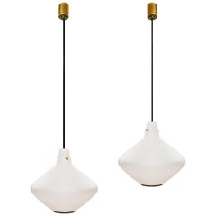 1960s Pair of pendants by Stilnovo, steel, brass and Opaline, Italy