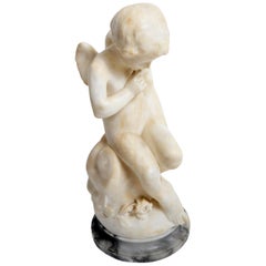 Marble Carving of a Sitting Cherub