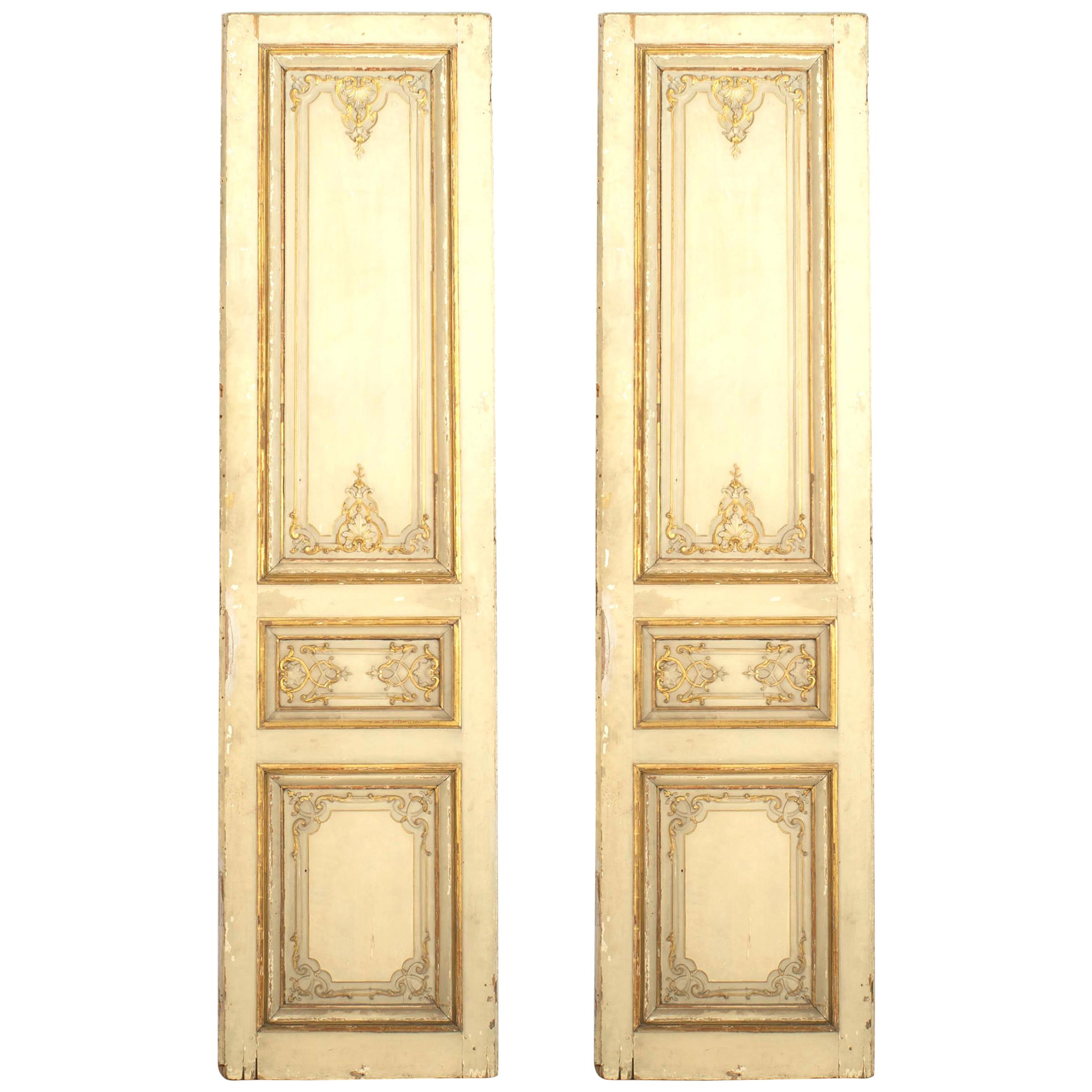 Pair of French Louis XV Style Gilt and White Painted Doors