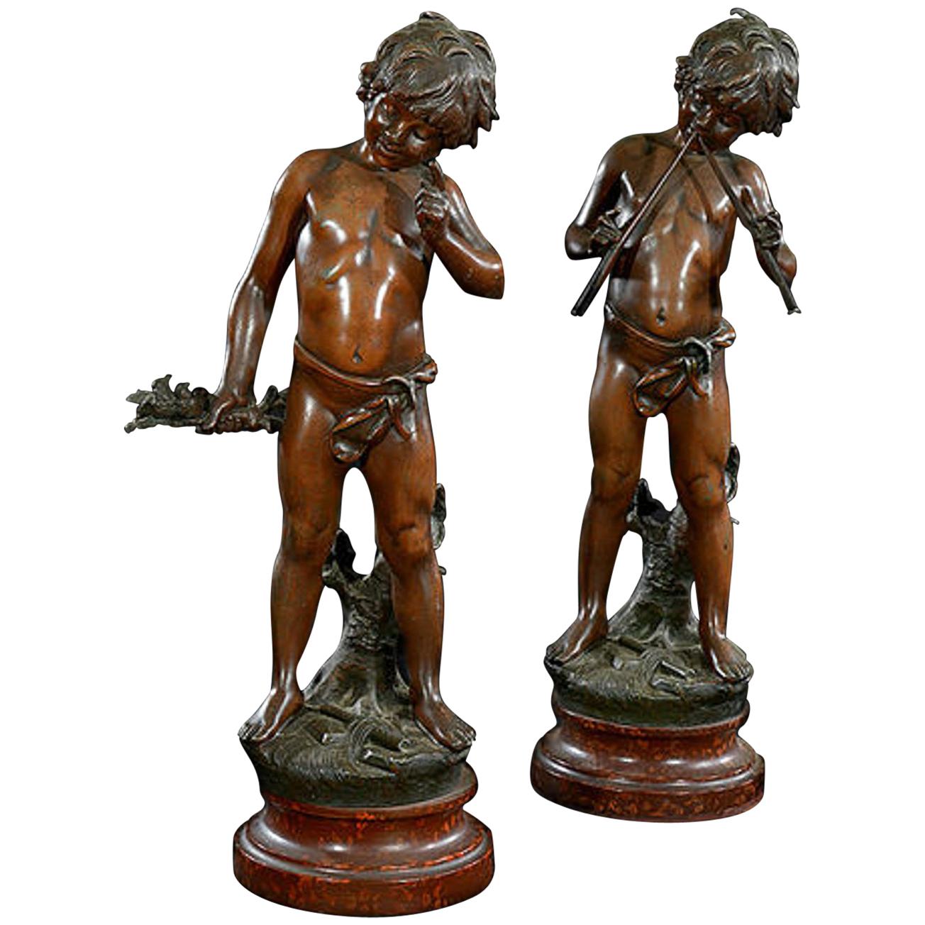 Pair of Late 19th Century French Painted Spelter Figures of Young Boys For Sale