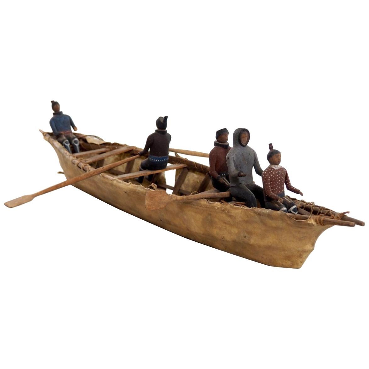 Important Eskimo Miniature Boat, with Carved and Original Painted Wood Figures