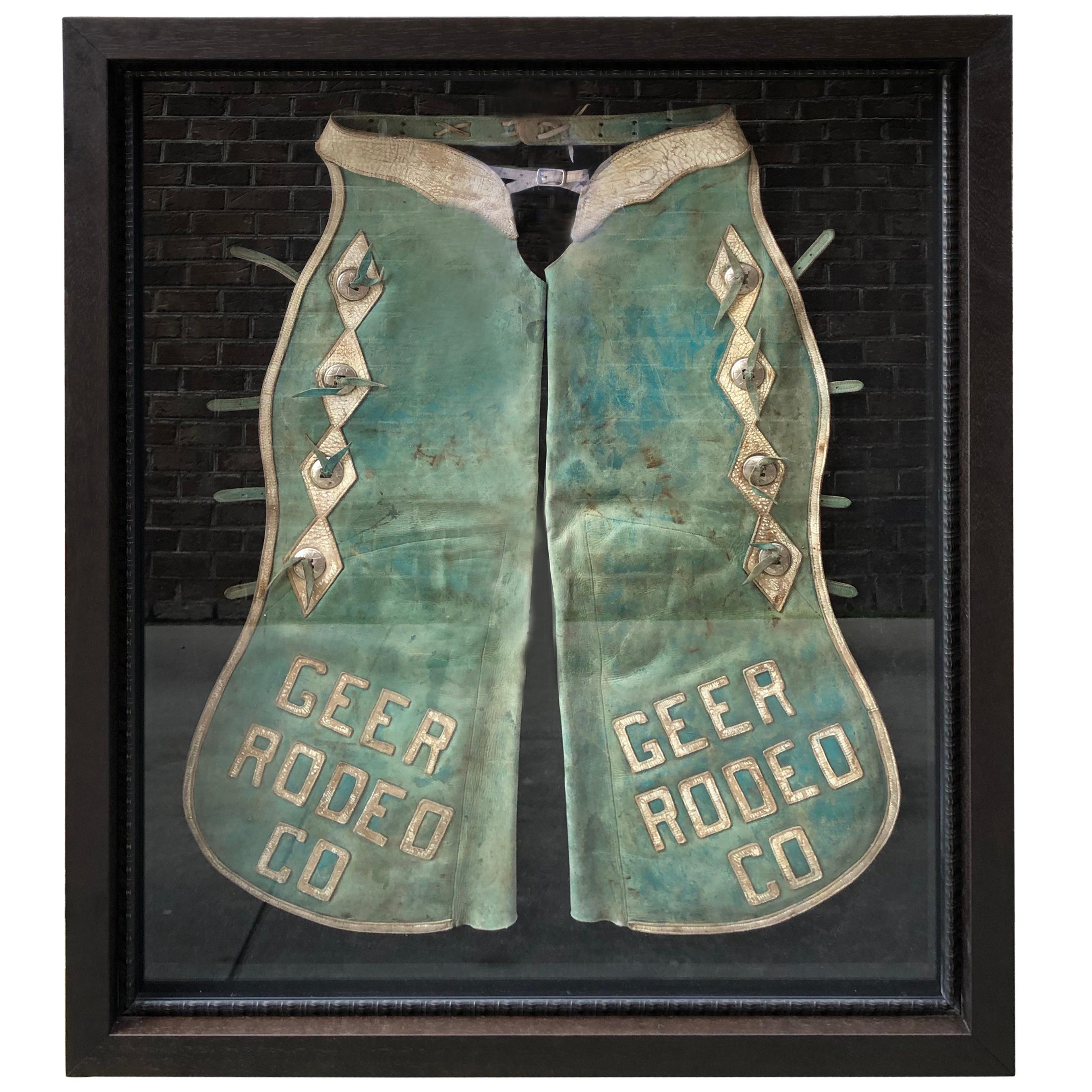 Pair of Faded Turquoise Chaps with Silver Mounts with Geer Rodeo Company