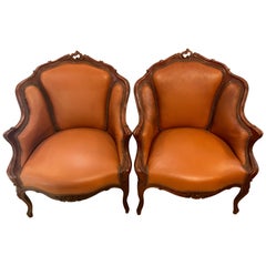Pair of Early 1920s Louis XV Style Barrel Back Bergere Armchairs