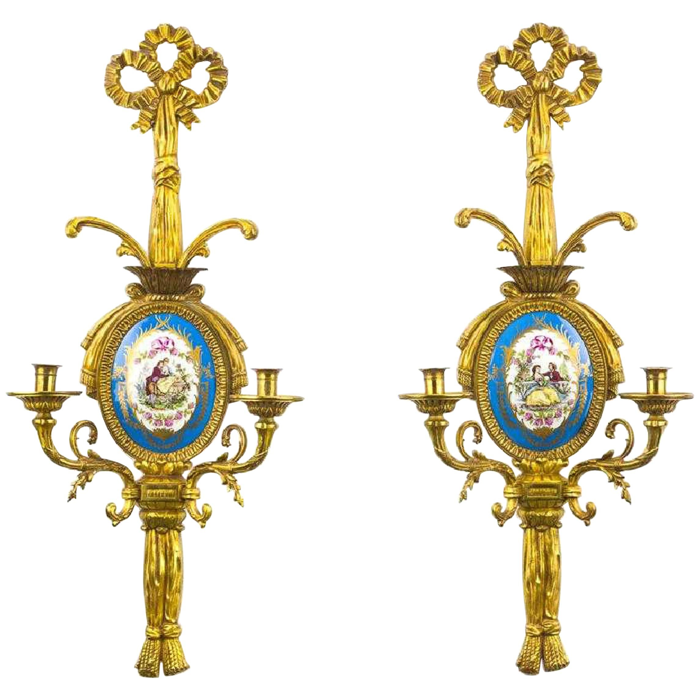 Pair of French Gilt Bronze and Sevres Sconces
