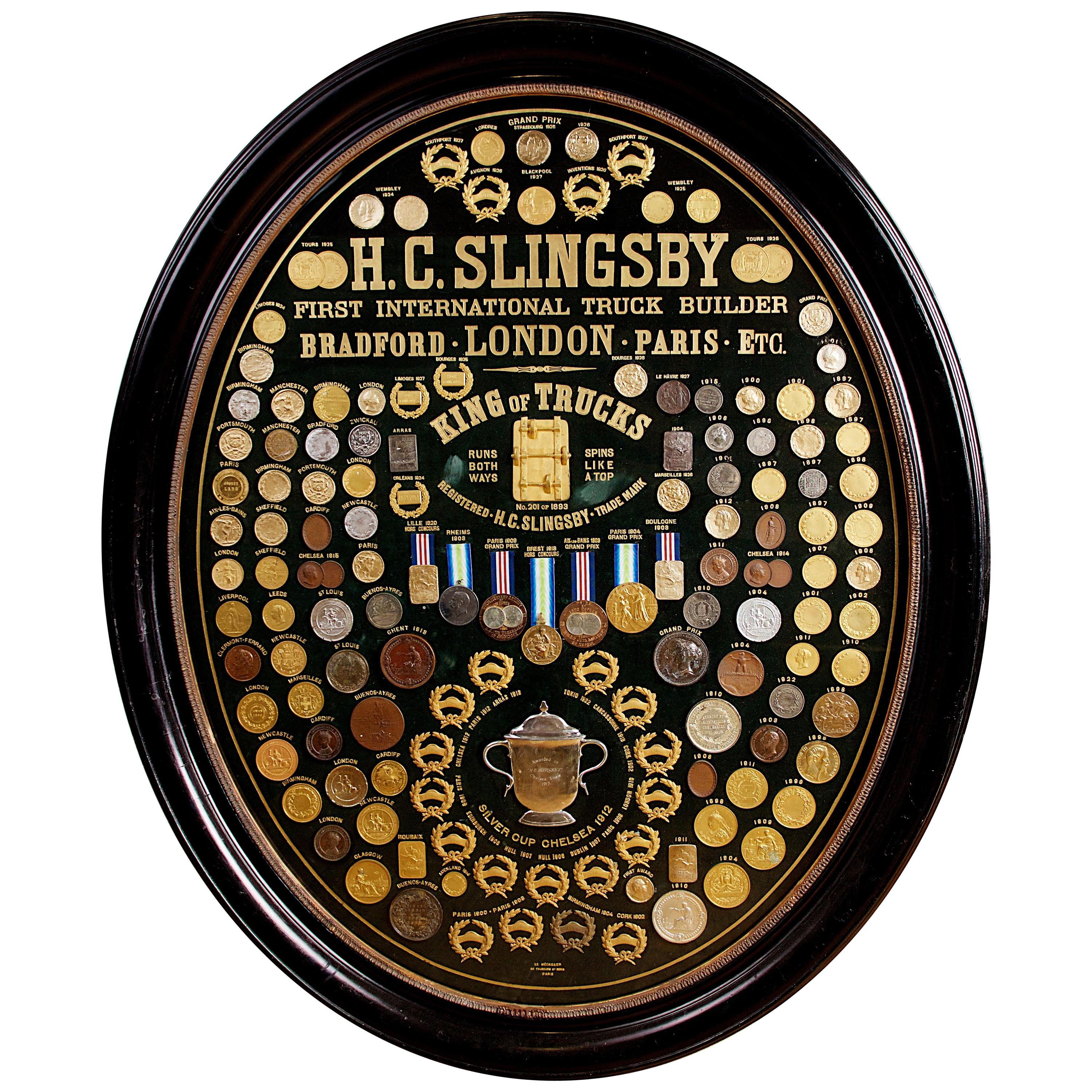 Display of Medals from H.C. Slingsby Truck Company, Set in Large Oval Frame For Sale