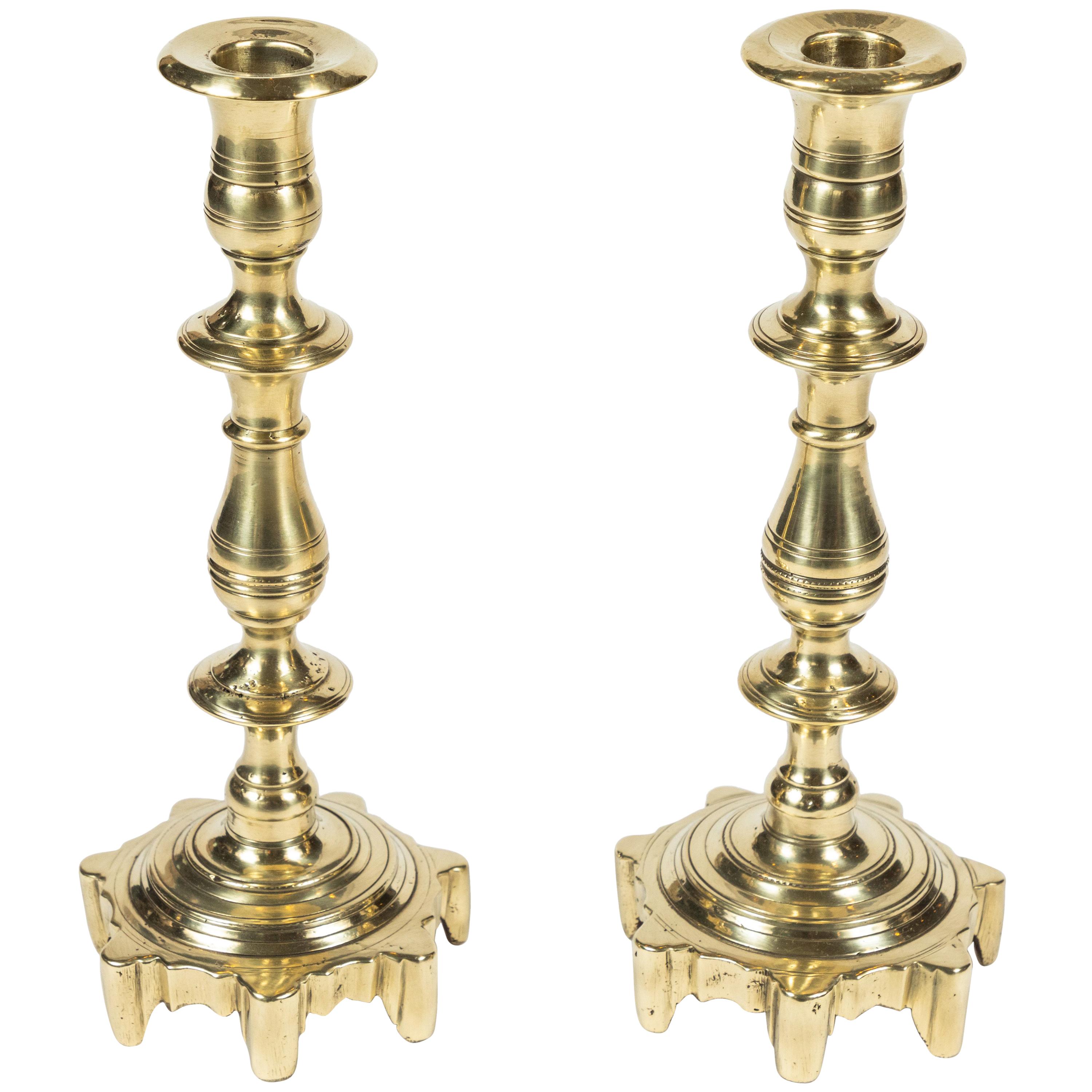 Pair of Antique Turned Stem and Multi Foot Base Brass Candlestick