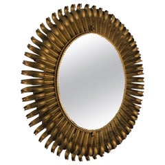 French Modern Neoclassical Oval & Gilt Iron Sunburst Mirror, Gilbert Poillerat