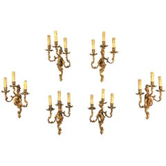 Set of Six Louis XV Style Sconces with Three Branches in Gilded Bronze