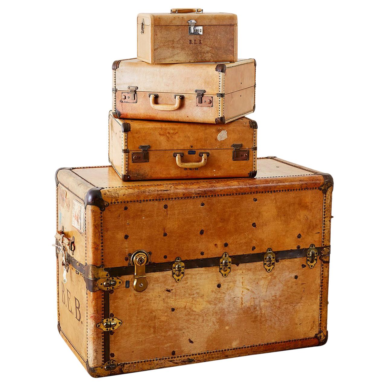 Set of Four Matching Steamer Trunk and Luggage
