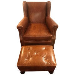 Fauteuil club et pouf en cuir délicieusement souple