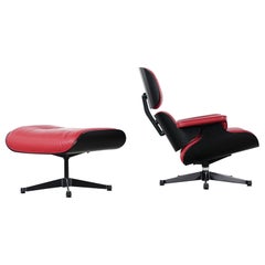 Chaise longue et pouf Charles Eames de Vitra en cuir rouge:: coquilles noires