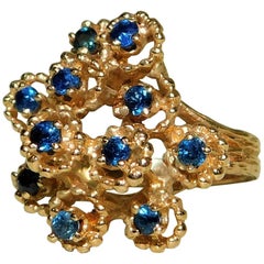 Vintage 14-Karat Gold Ladies Floral Design Cocktail Ring with Blue Sapphire Gemstones