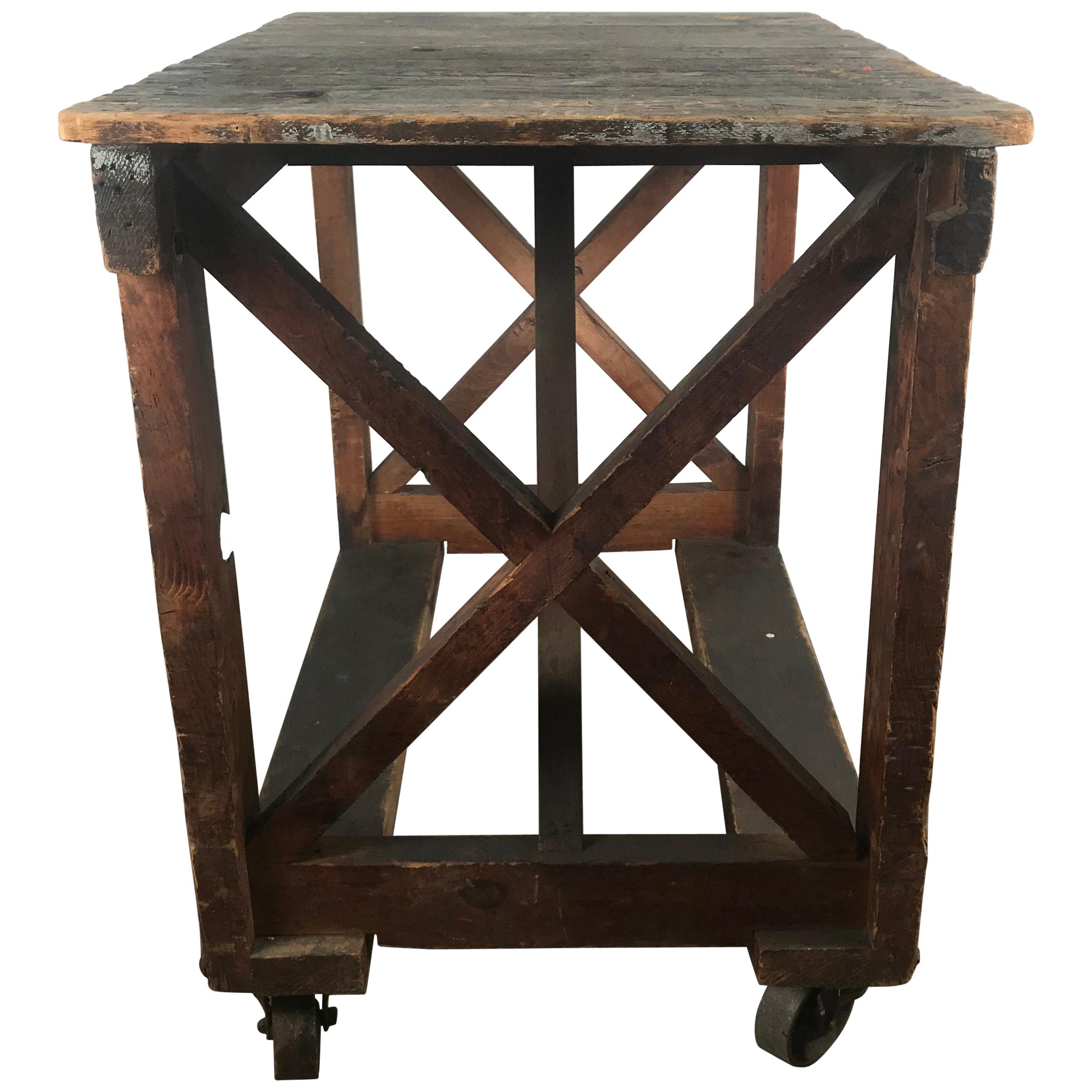 Antique Industrial Factory Work Table on Iron Castors For Sale