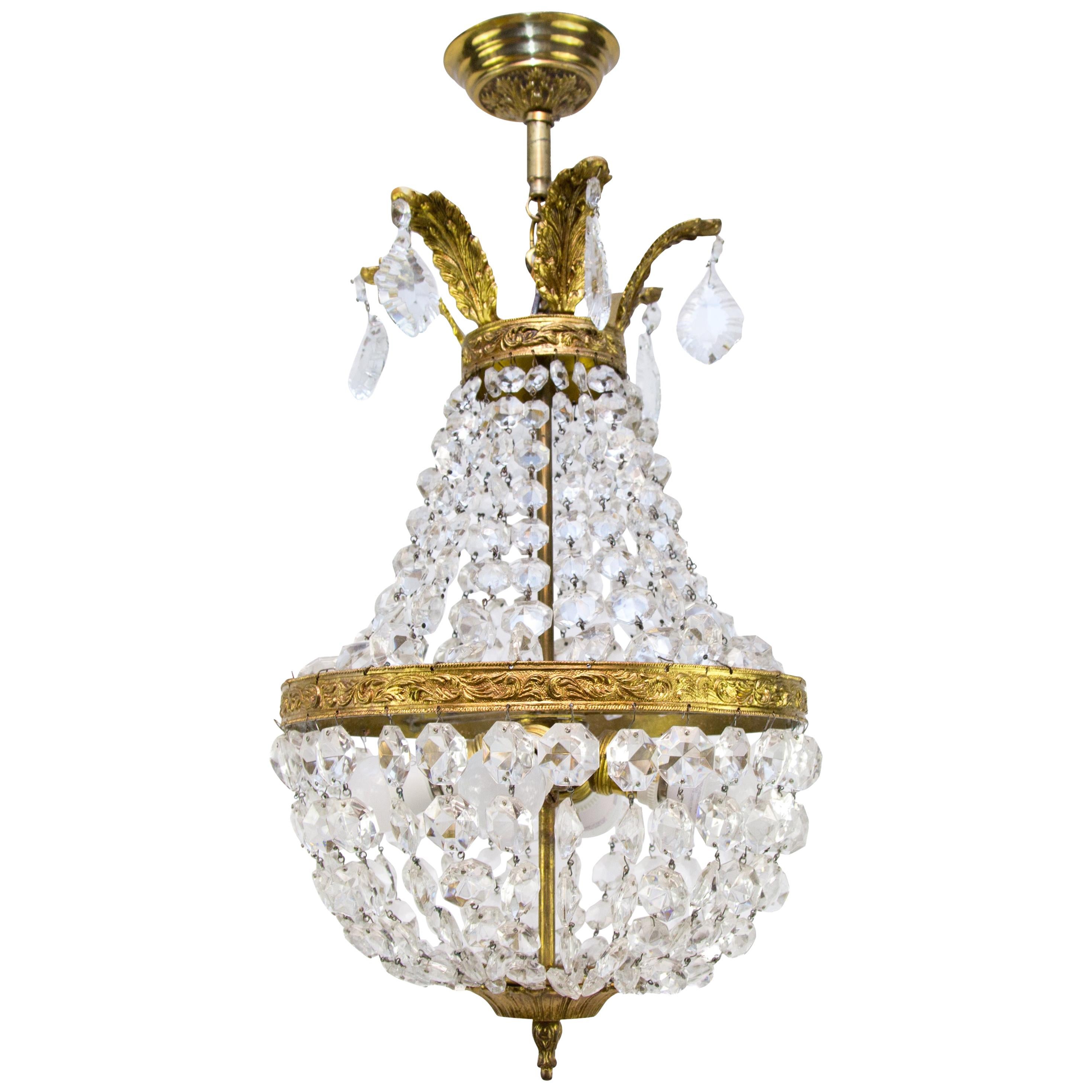 French Empire Style Crystal and Bronze Four-Light Basket - Shaped Chandelier 