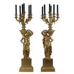 Magnifique paire de chandeliers figuratifs en bronze doré de la période Empire, circa 1815