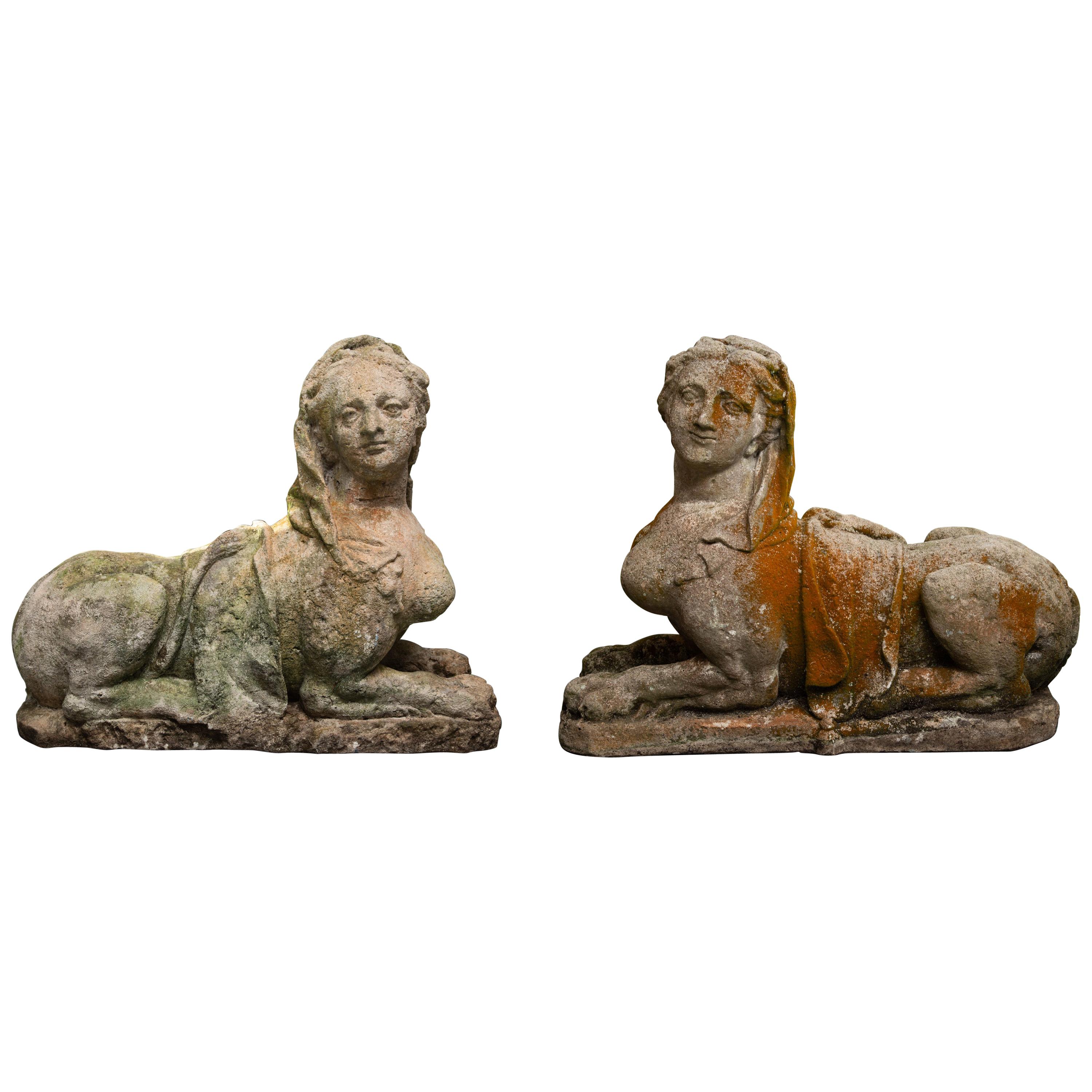 Pair of Cast Stone Egyptian Revival Sphinx Figures