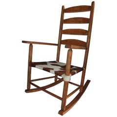 Chaise à bascule du début du 20ème siècle en cuir de vache