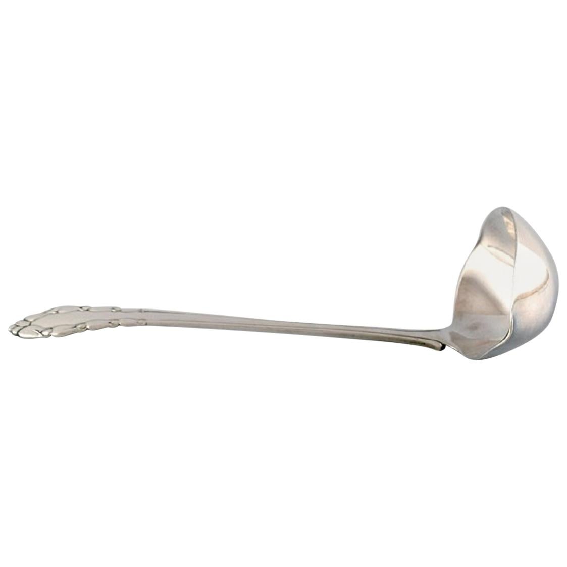 Cuillère à sauce « Lily of the Valley » de Georg Jensen en argent massif