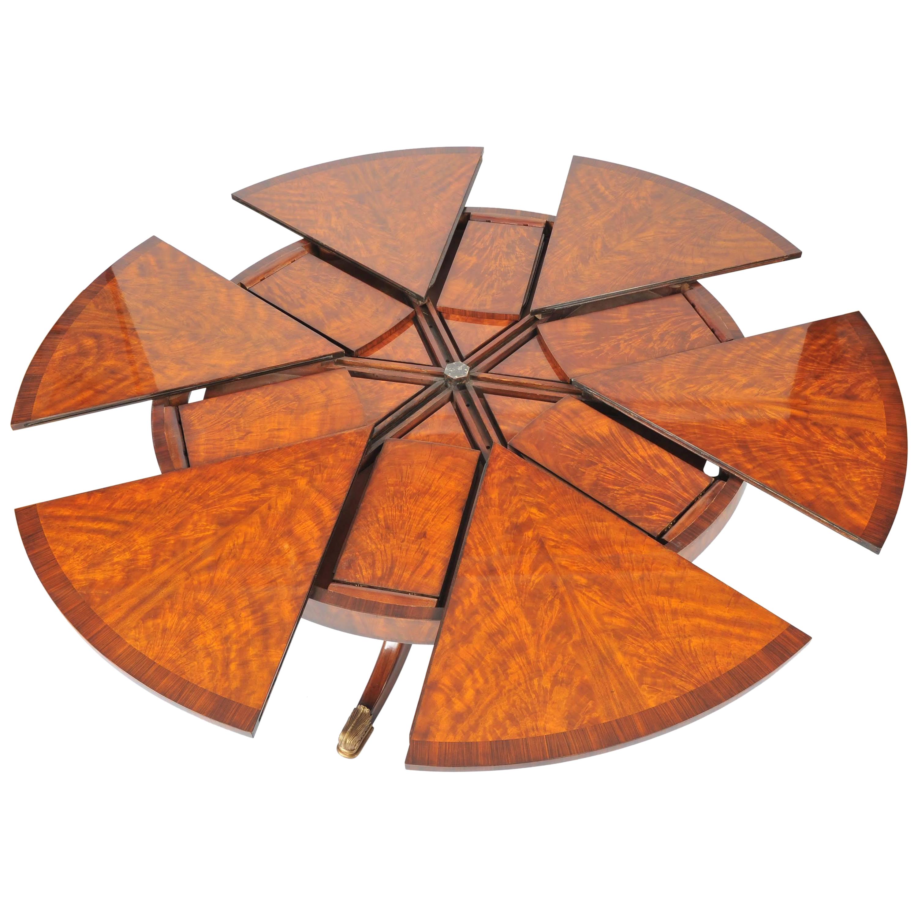 Flame Mahogany Segmented Circular Extending Table