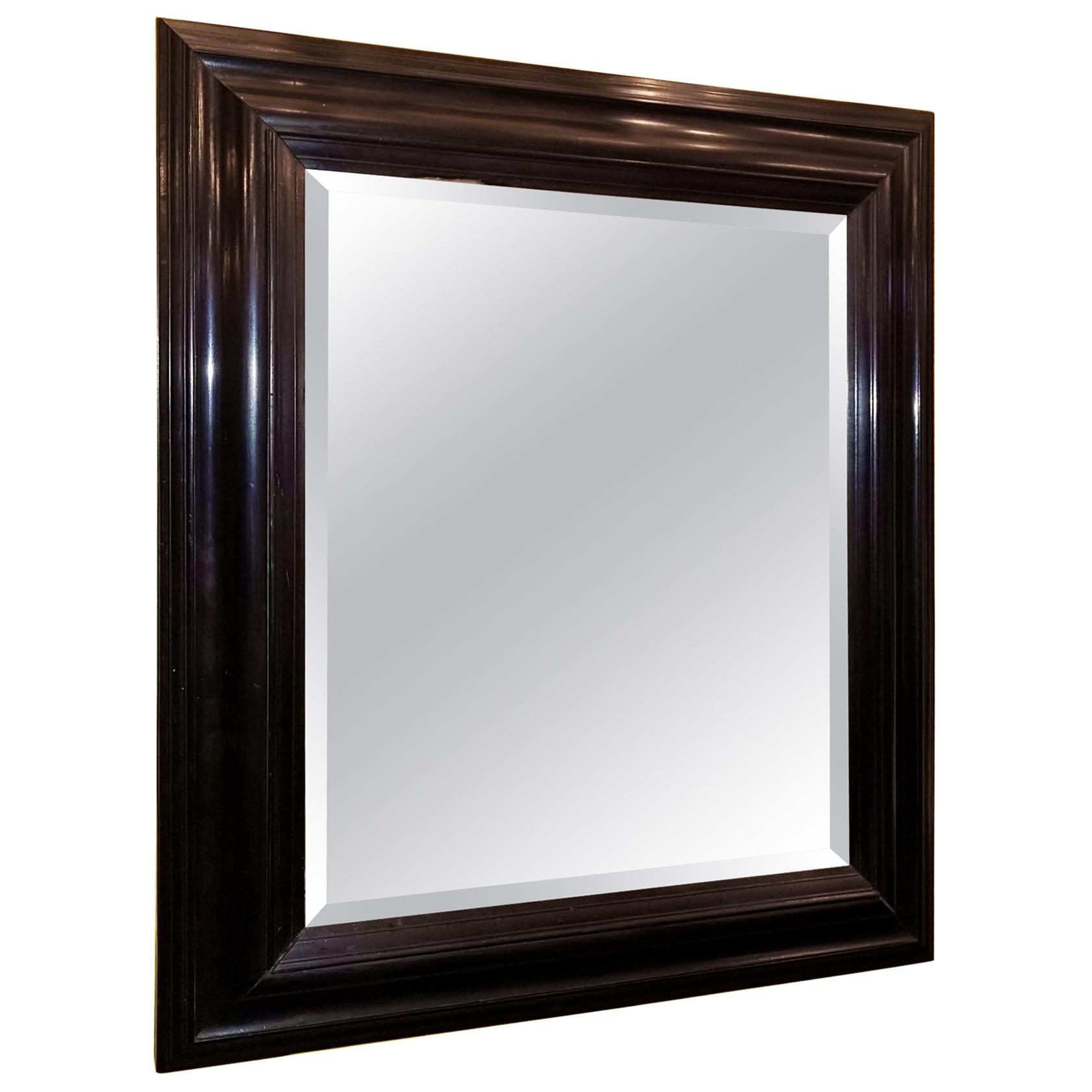 19th Century American Ebony Mirror with Bevelled Glass