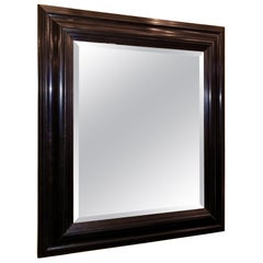 19th Century American Ebony Mirror with Bevelled Glass