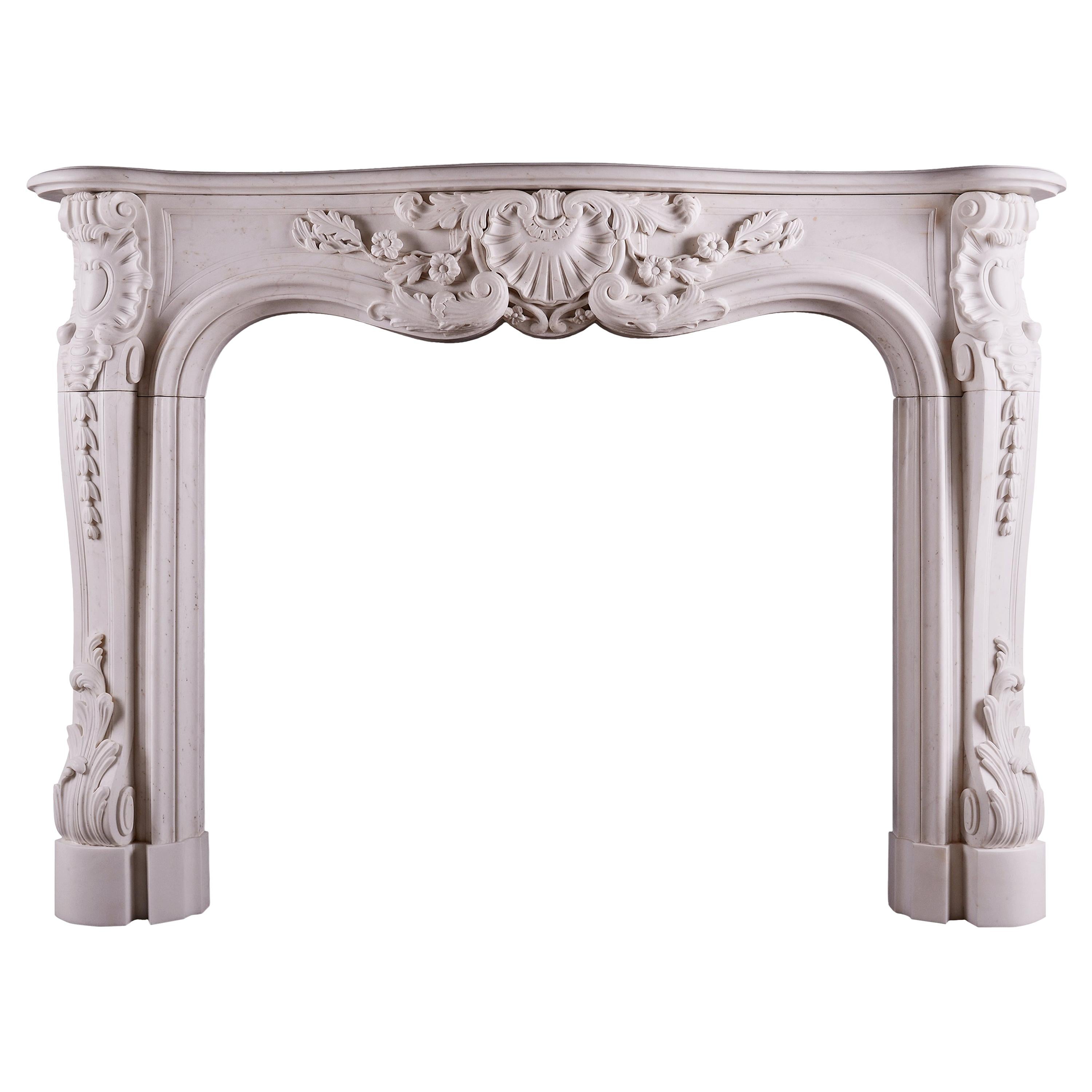 Heavily Carved French Louis XV Style Fireplace For Sale