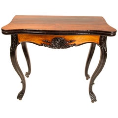 Victorian Fine Carved Partly Ebonized and Rosewood Game Table