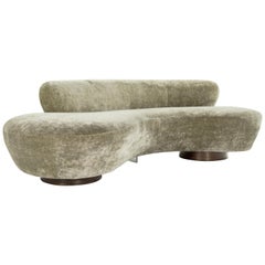 Curved Sofa on Walnut Bases by Vladimir Kagan