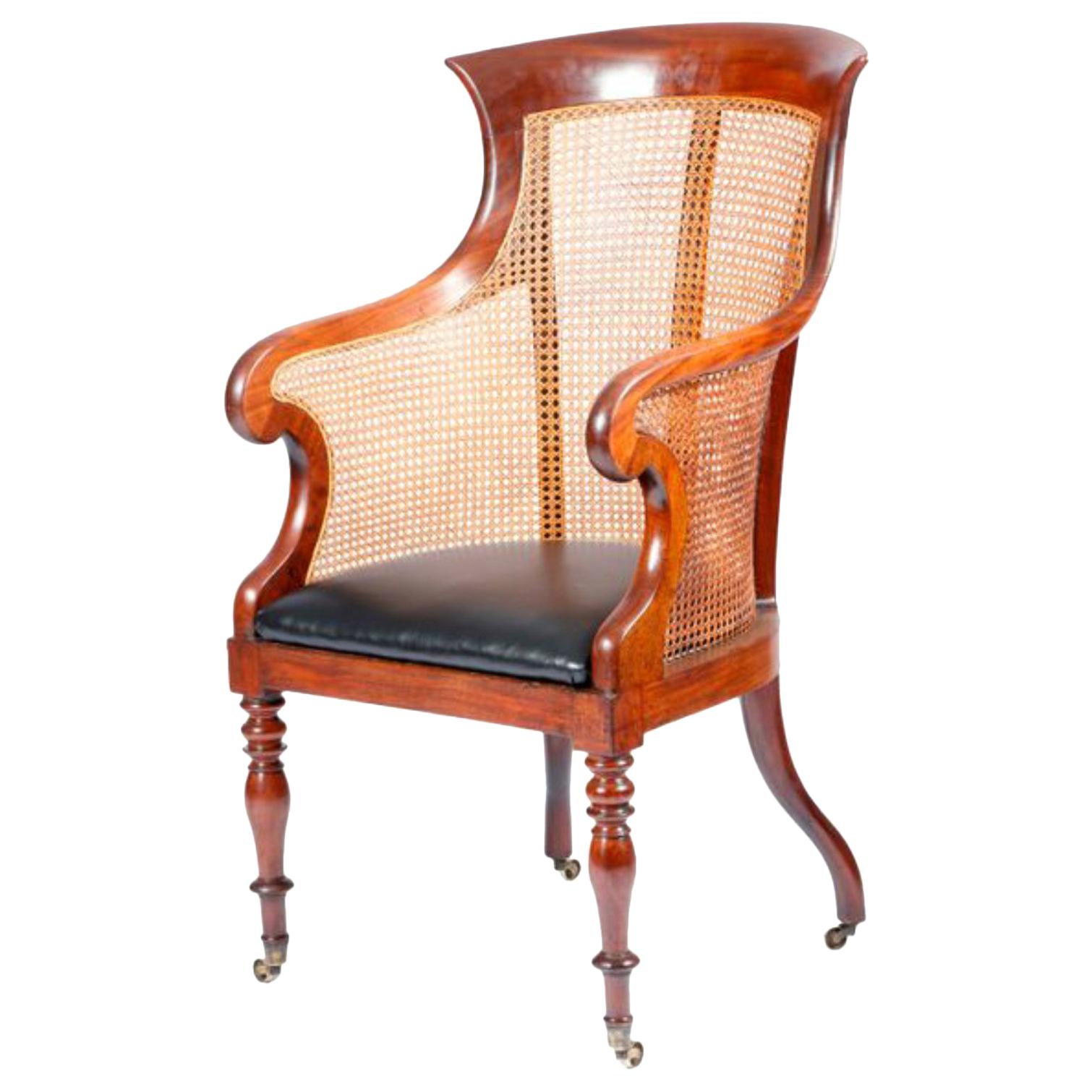 19th Century English Victorian Mahogany Library Chair with Caned Back and Sides