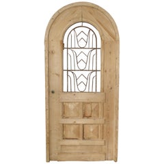 Arched Stripped Pine and Iron Entry Door from the Netherlands