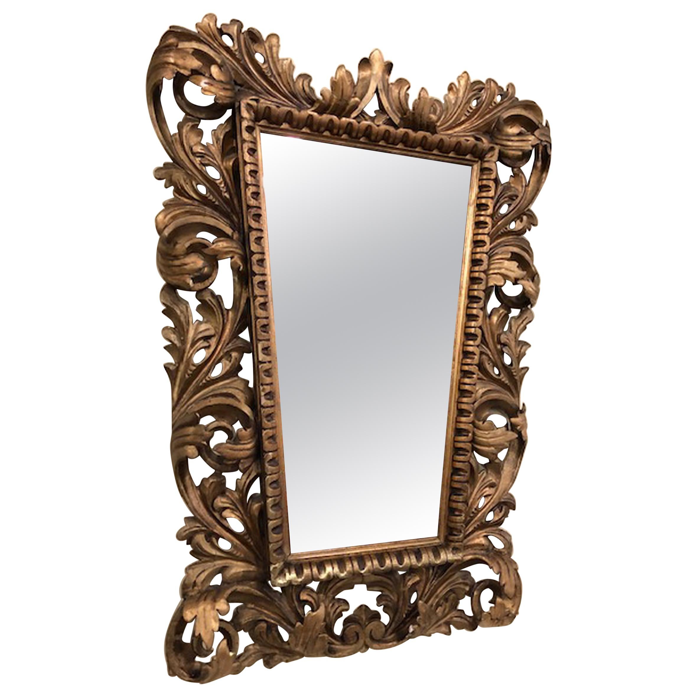 Gilded Florentine Wall Mirror with Leaf and Floral Ornamentation For Sale