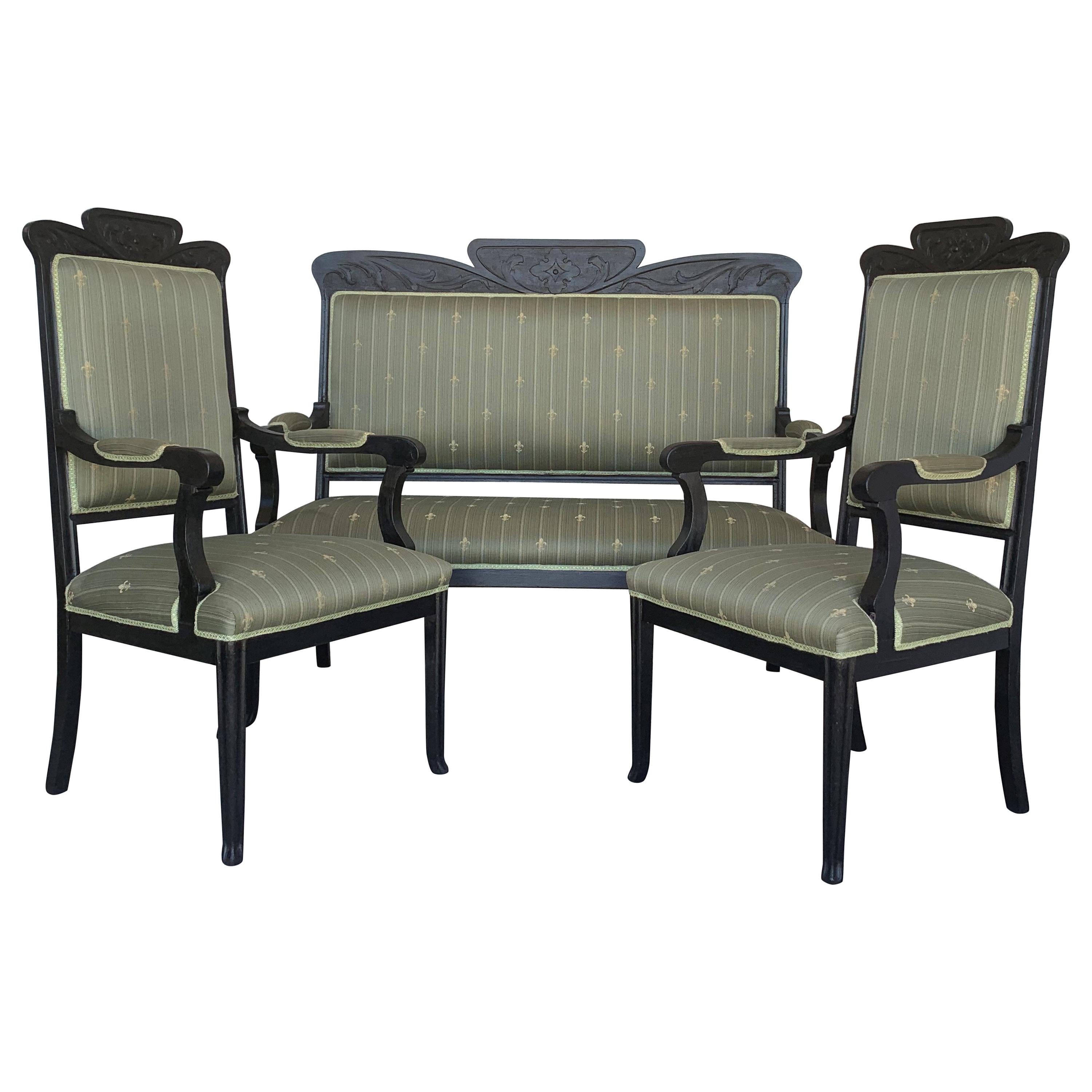 20th Black French Seating Set Sofa and Two Armchairs in the Louis Seize Style For Sale