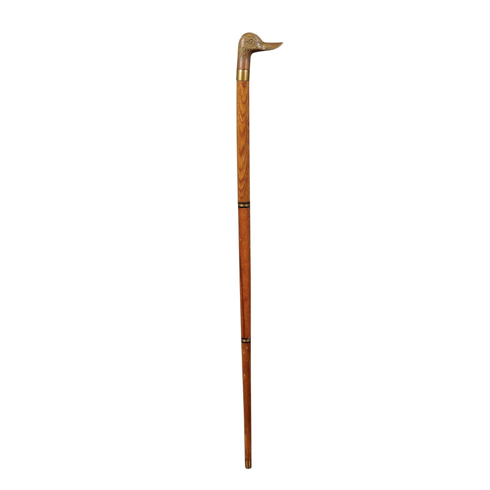English Wooden Walking Cane with Brass Duck Head Handle and Ebonized Accents