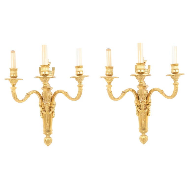Pair of French Louis XVI Style Gilt Wall Sconces For Sale at 1stDibs