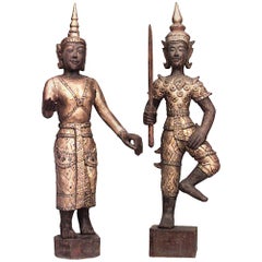 Paire de figurines thaïlandaises dorées et ornées de bijoux