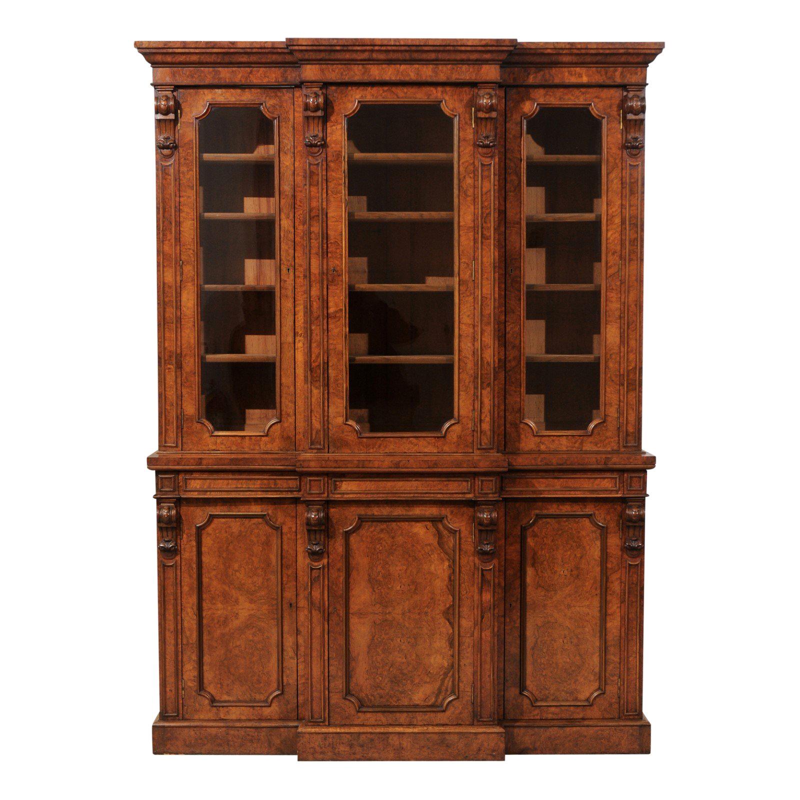 English 1880s Burled Walnut Breakfront Bookcase with Glass Doors and Volutes