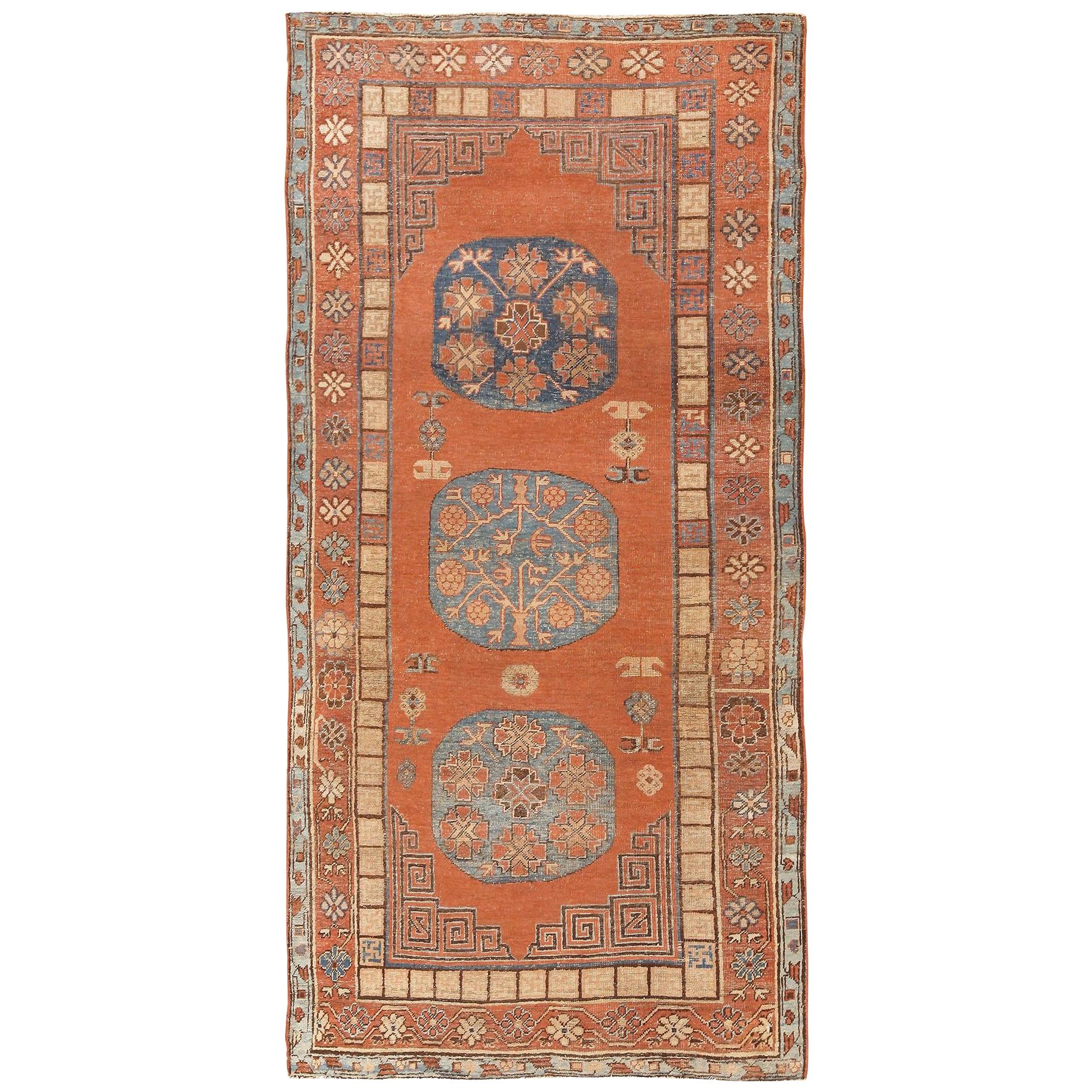 Tribal Rust Pomegranate Design Antique Khotan Rug