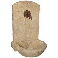 Small Carved Limestone Wall Fountain with Circular Basin