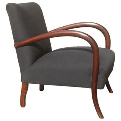 Fauteuil italien ancien minimaliste des années 1950 avec accoudoirs ronds et arrondis noirs et bruns