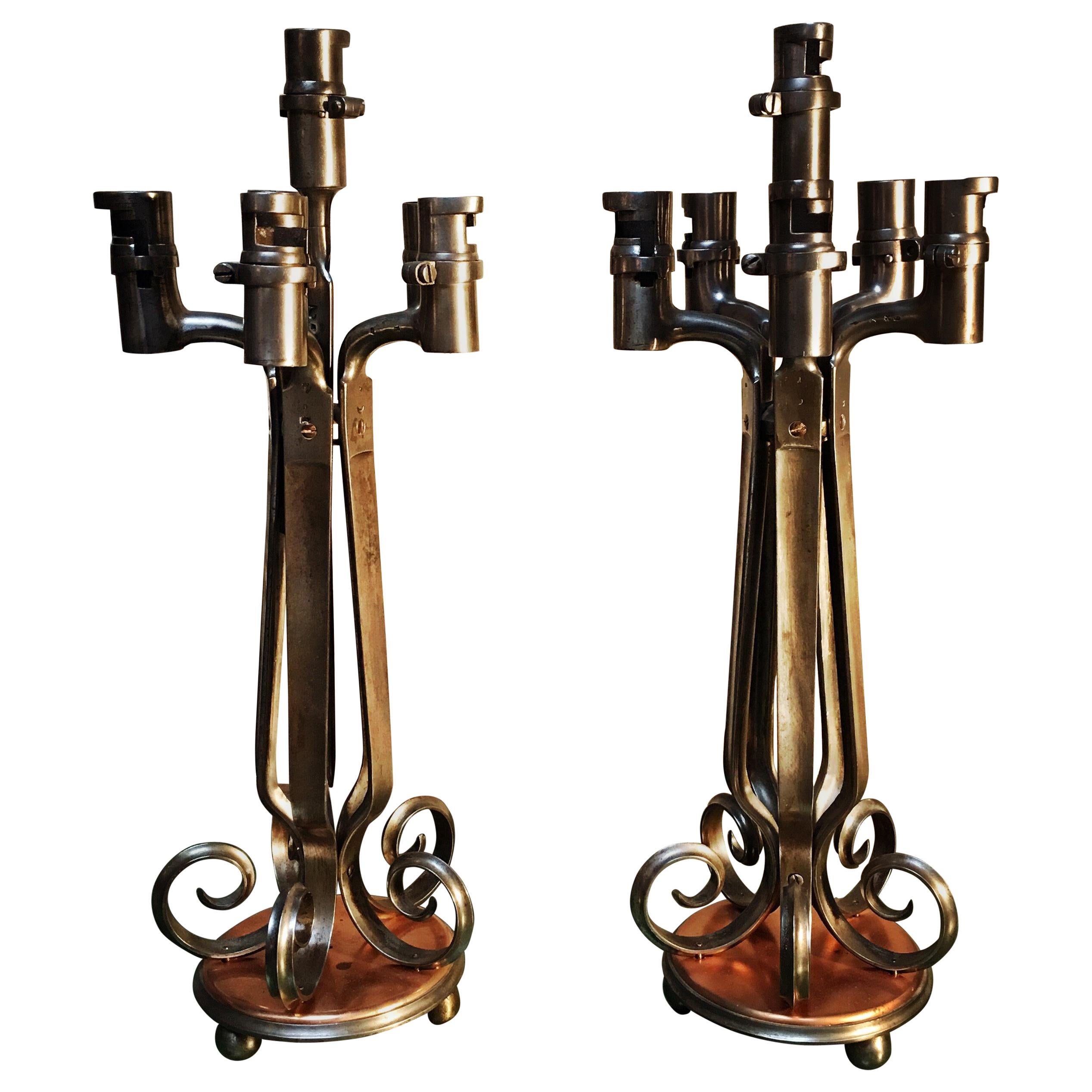 Pair of Bayonet Polished Steel and Copper Candelabra