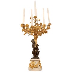Monumental Single Louis XVI Style Ormolu and Patinated Seven-Light Candelabra