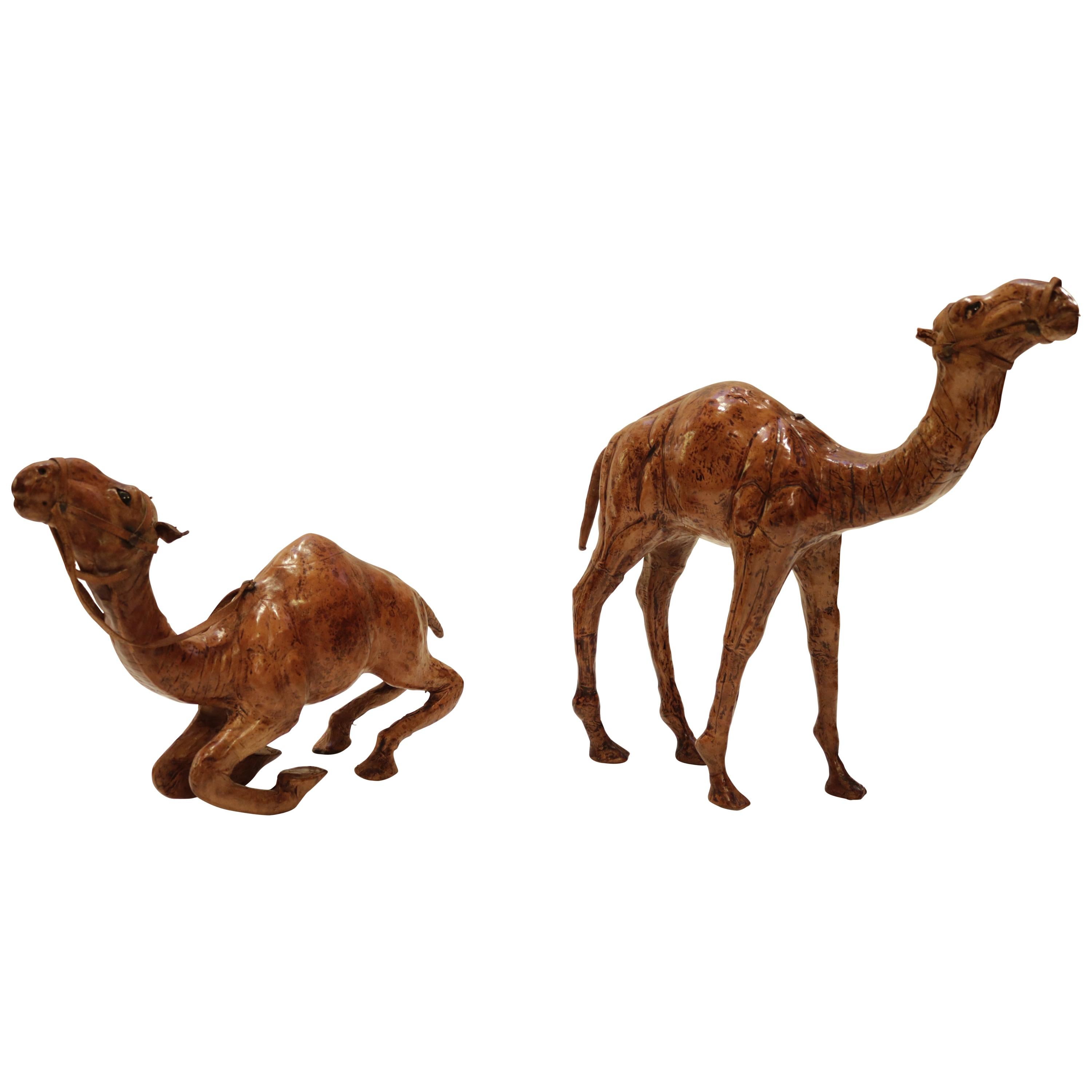 Set of Two Leather Wrapped Camel Sculptures
