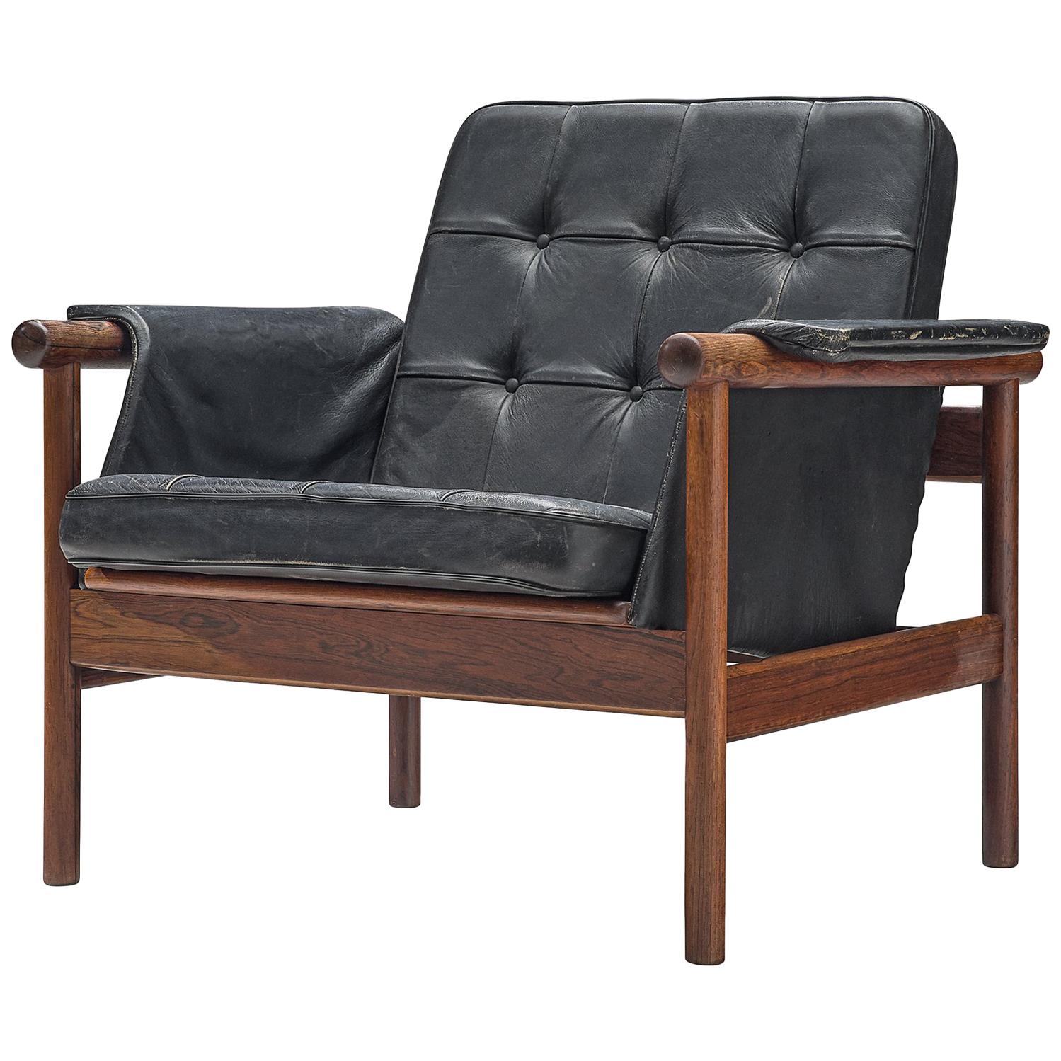 Illum Wikkelsø Lounge Chair in Original Black Leather and Rosewood, 1960s