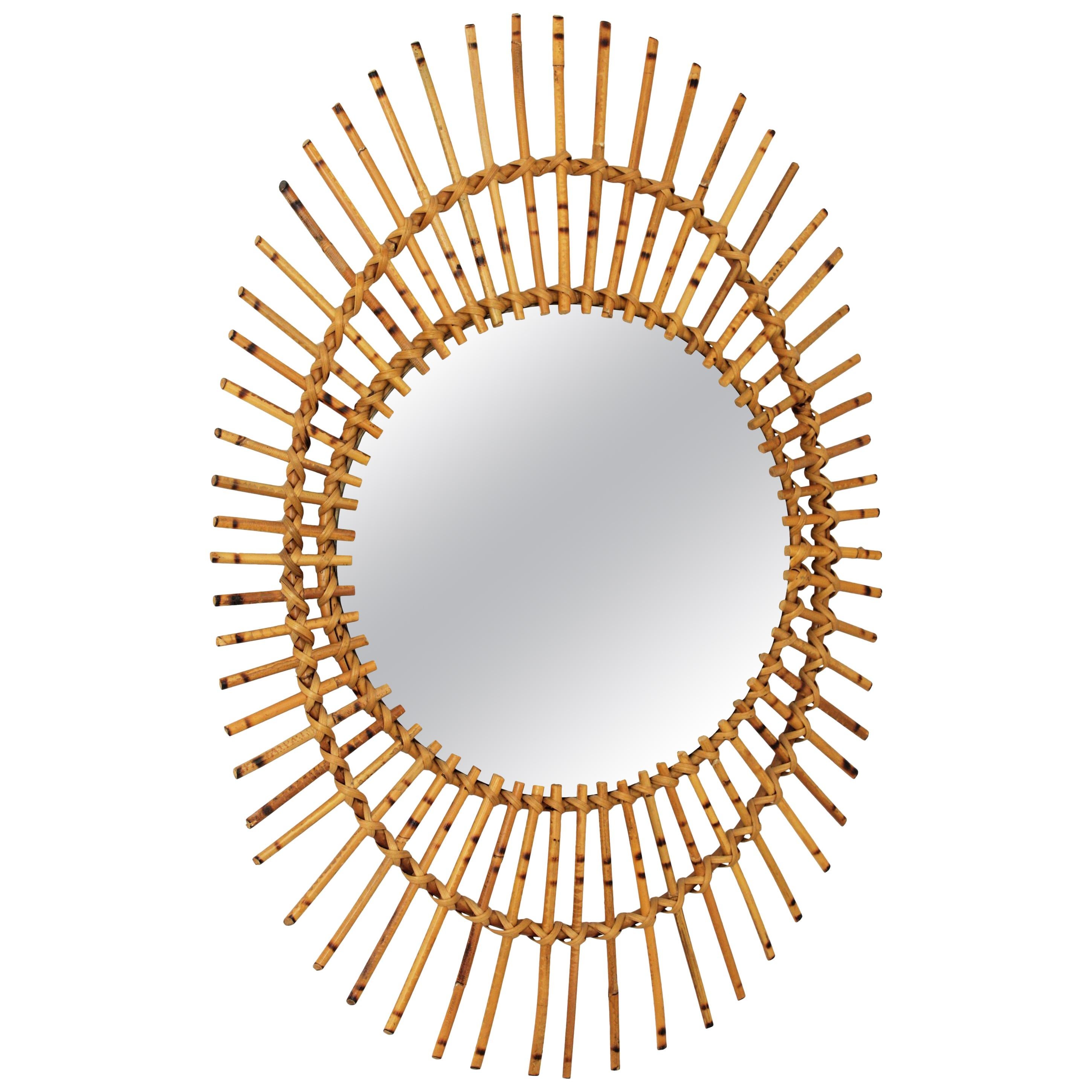 Mid-Century Modern French Riviera Rattan Asymmetric Oval Sunburst Mirror