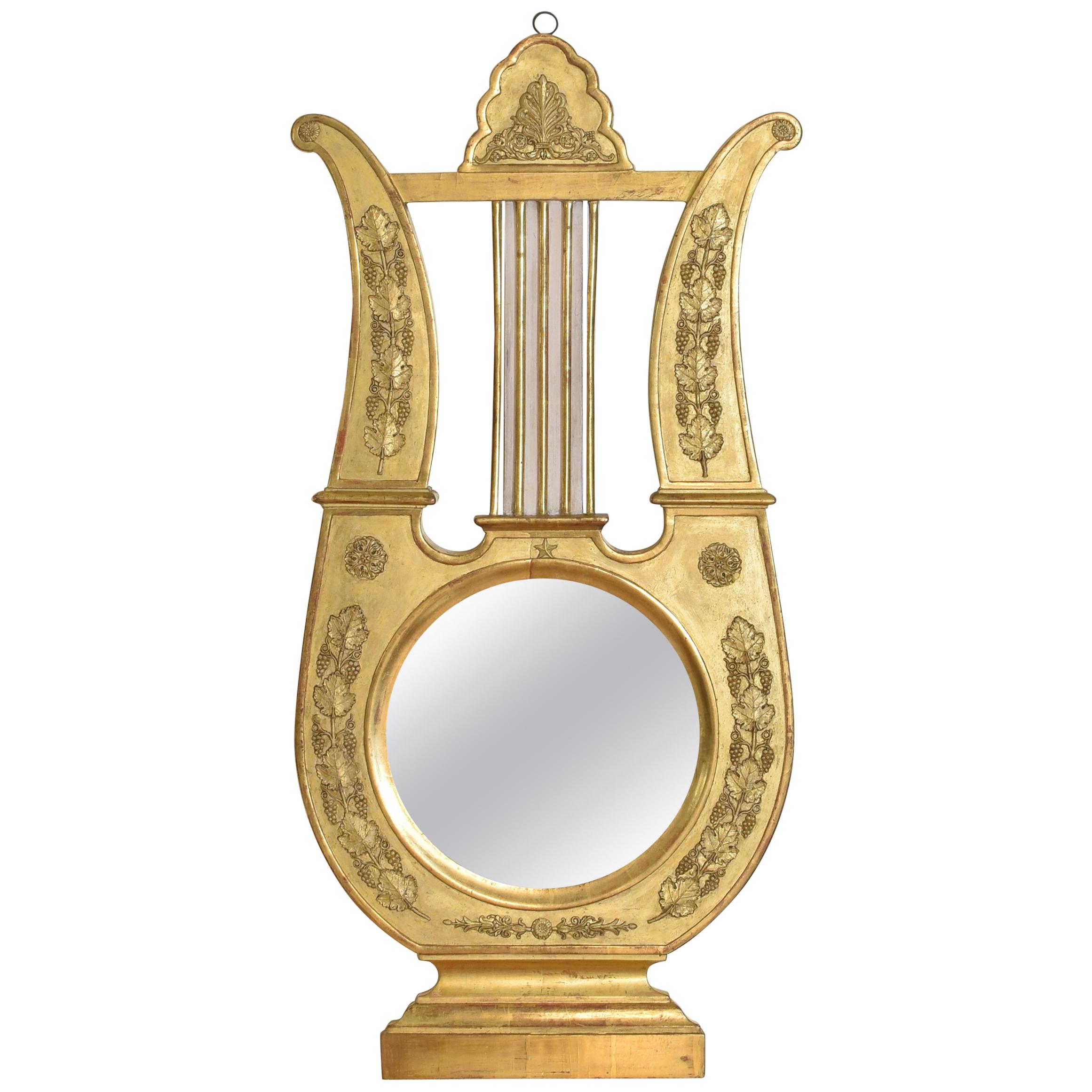 Miroir en bois doré sculpté de la période de l'Empire français, autrefois baromètre, 19ème siècle