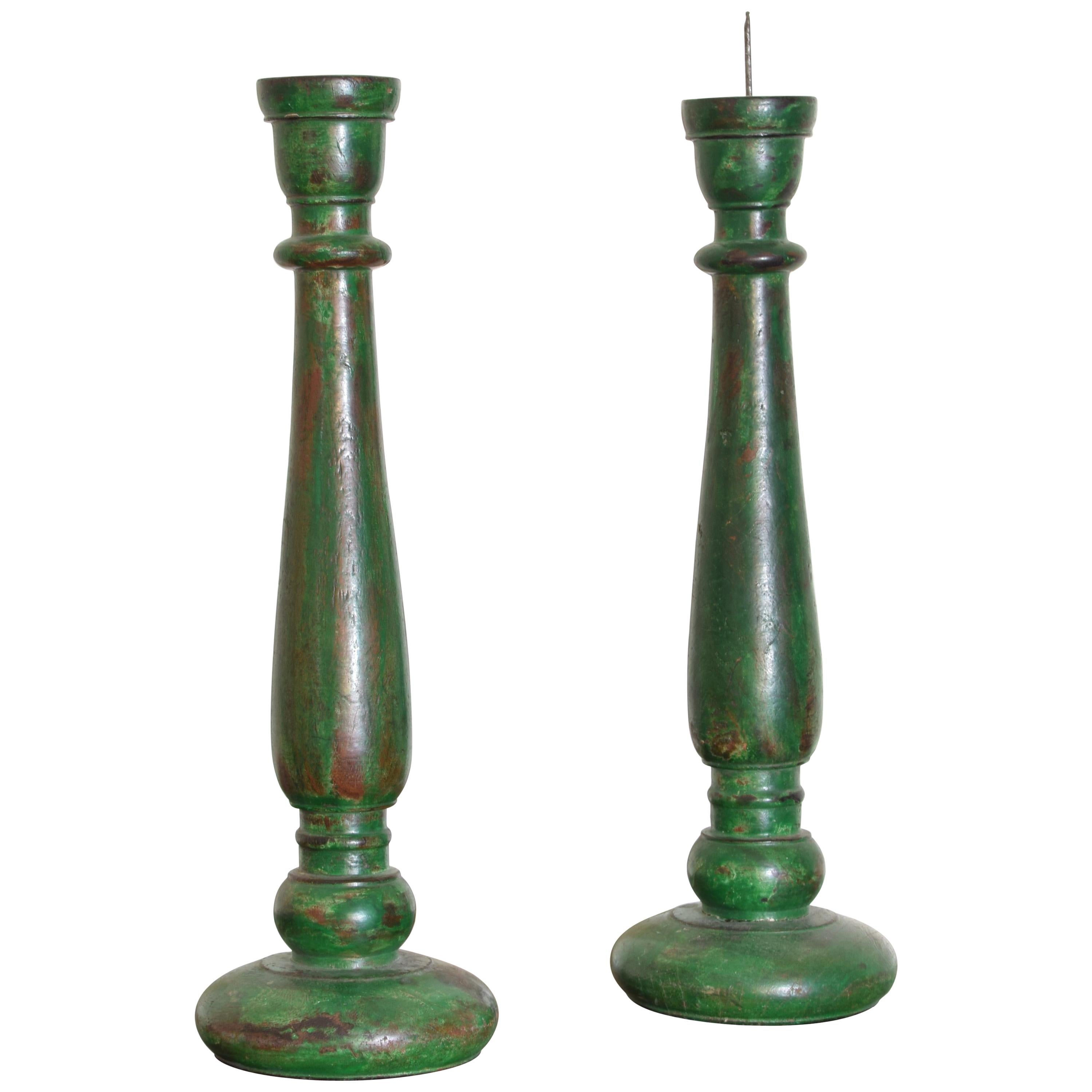 Pair of French LPhilippe Style Turned and Green Painted Wooden Candlesticks