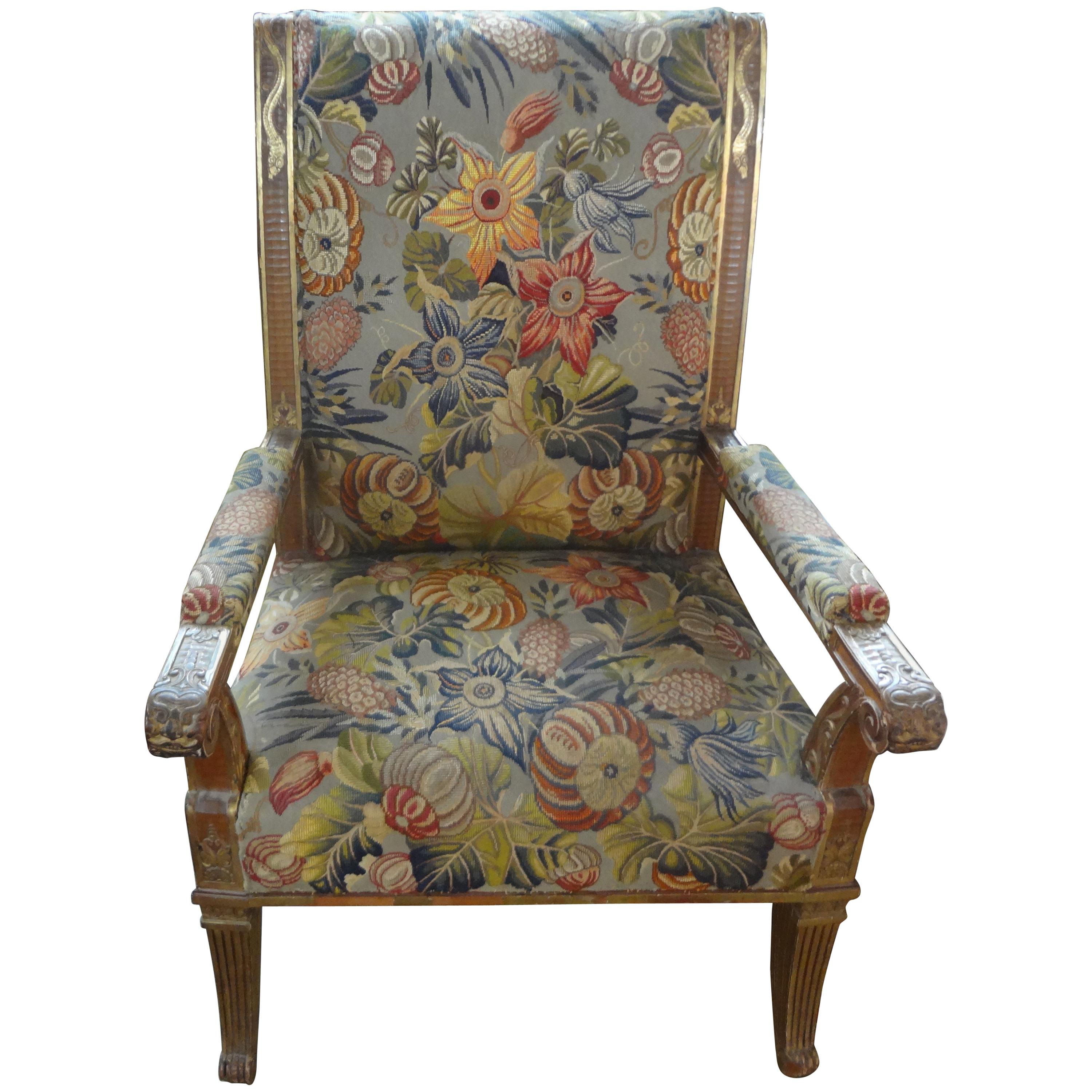 Magnificent 19th century French Louis XVI style gilt wood chair, armchair or fauteuil with splayed legs. This unusual, rare one of a kind antique French gilt chair has beautiful details throughout including serpents or snakes and Klismos style legs.