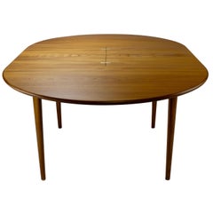 Danish Modern Teak Round Dining Table with Butterfly Leaf